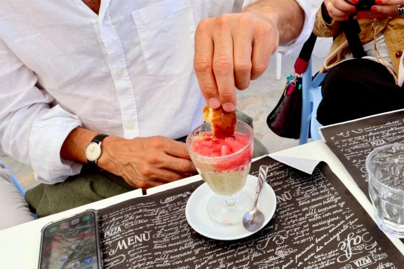 We try Alfredo's Granita with bread on Salina Island, Aeonian Islands, Sicily
